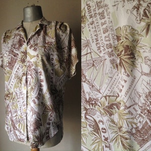 Brown/khaki/olive green safari styled 80's buttoned down shirt with short bat sleeves and shoulder pads