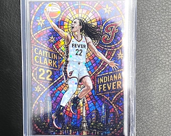 May include: A rectangular sports trading card featuring a basketball player in a white jersey with the text FEVER 22. The background has a colorful stained glass pattern with the text CAITLIN CLARK, 22, INDIANA FEVER, and a large letter F.
