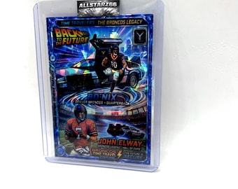 May include: A collectible trading card featuring John Elway of the Denver Broncos. The card has a futuristic design with the text "Back to the Future" and "Time Travelers." The card is encased in a protective sleeve.
