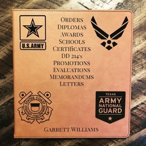 May include: A brown leather folder with a black U.S. Army logo, a black Air Force logo, a black United States Coast Guard logo, and a black Texas Army National Guard logo. The folder has the text "ORDERS, DIPLOMAS, AWARDS, SCHOOLS, CERTIFICATES, DD 214's, PROMOTIONS, EVALUATIONS, MEMORANDUMS, LETTERS" and "GARRETT WILLIAMS" printed on it.