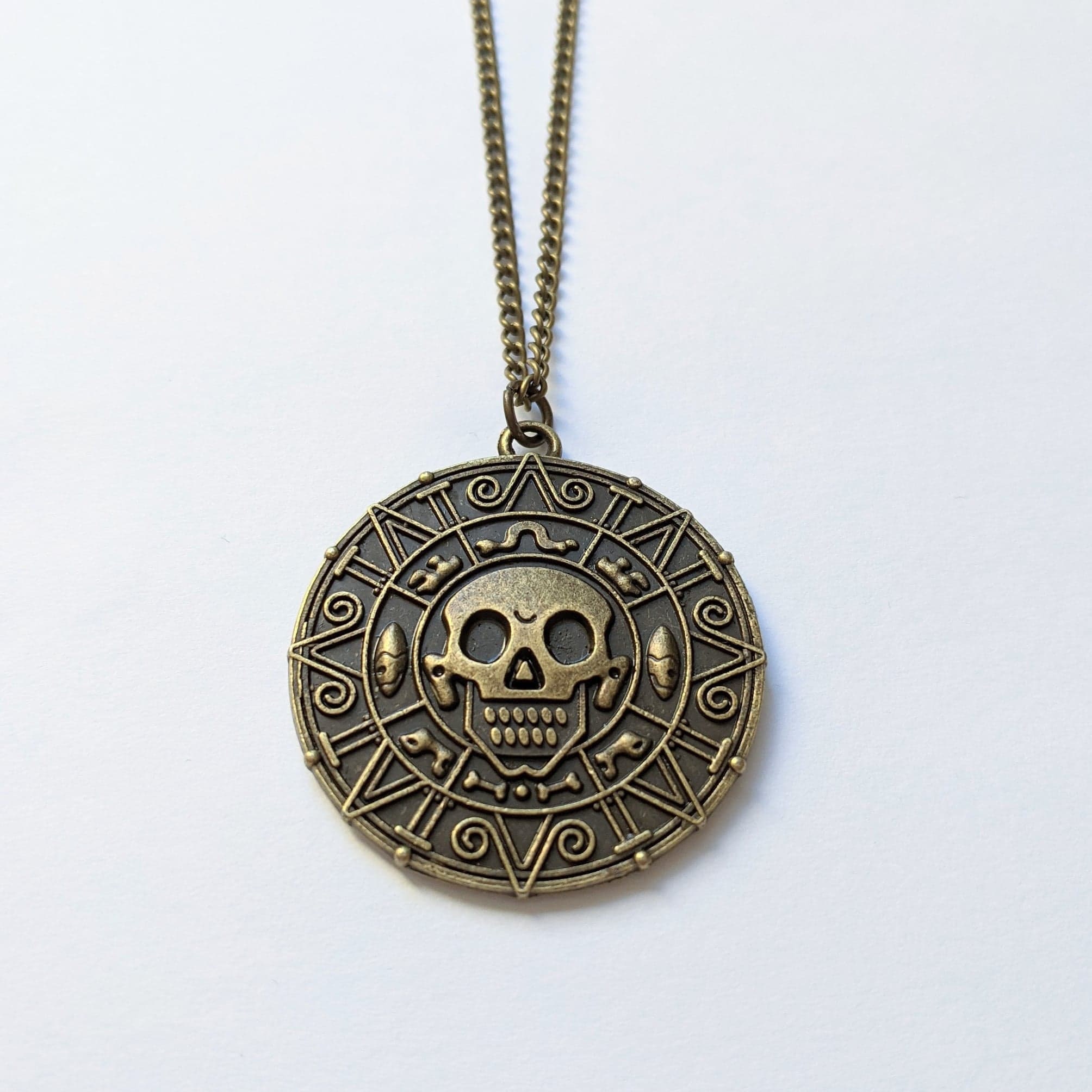 Amazon.com: Pirates Of The Caribbean Movies Cursed Aztec Coin Medallion  Necklace Gold : Clothing, Shoes & Jewelry