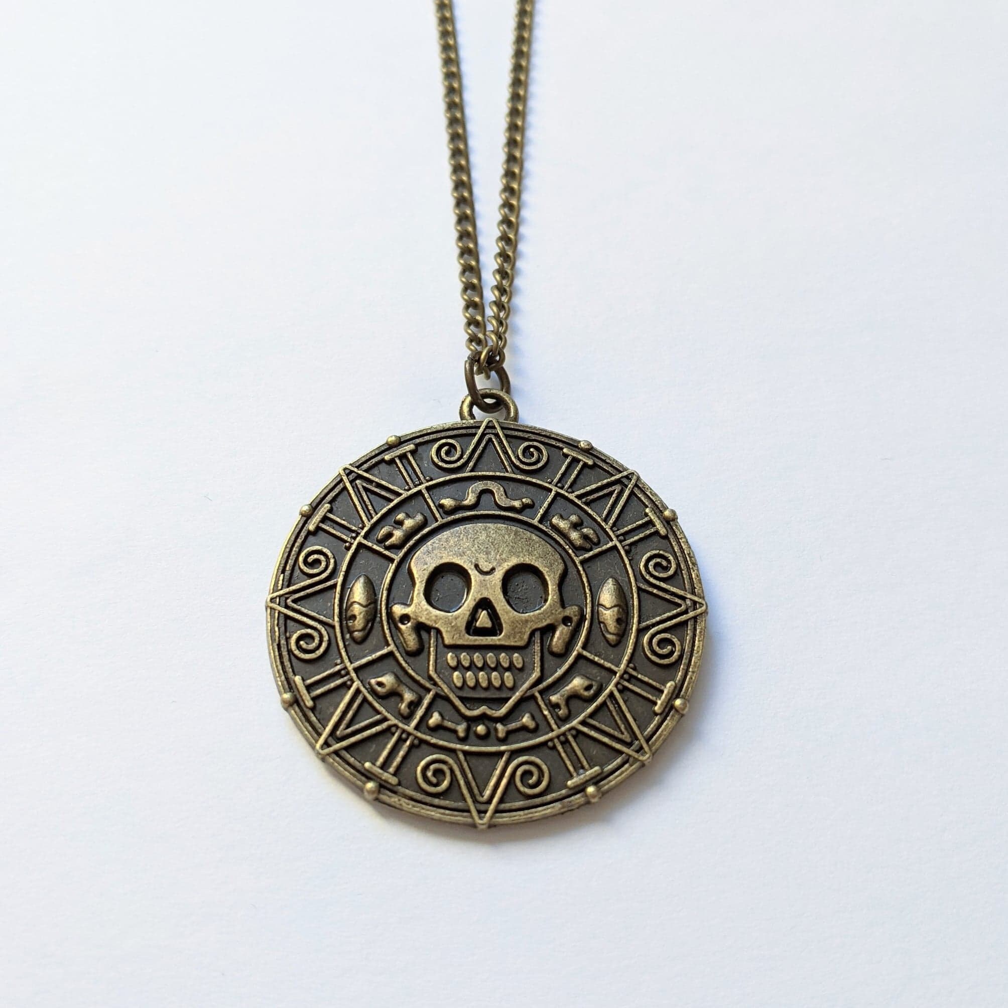Pirates of the caribbean necklace deals