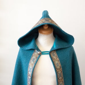 100% wool cloak with jacquard trim