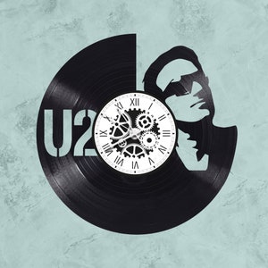 33 rpm vinyl record clock U2 theme music BONO group