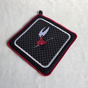 Hollow Knight - Silksong - Hornet - Hotpad, pannenlap