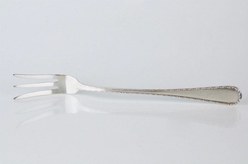 International Sterling Silver Pine Tree Pattern Olive Fork No Monogram