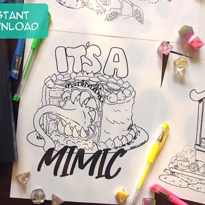 May include: A black and white line drawing of a cake with a monster's face and the text "It's a Mimic".
