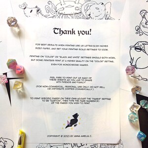 May include: A printable colouring book page featuring a frog wearing a wizard hat and holding a staff. The page is surrounded by dice and other colouring pages. The text on the page reads "Thank you!" and includes instructions for printing the pages. The copyright information at the bottom of the page reads "Copyright &copy; 2023 by Anna Amelia C."