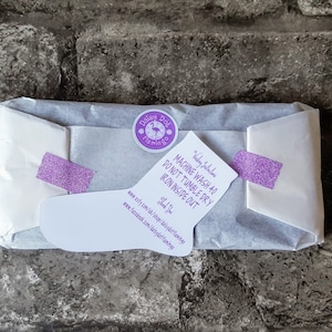 May include: A white package with a purple and white sticker that says "Daisy Dot Flamingo" and "Machine Wash 40, Do Not Tumble Dry, Iron Inside Out". The sticker also includes the website address "www.etsy.com/uk/shop/daisydotflamingo" and "www.facebook.com/daisydotflamingo".