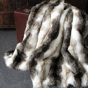 Italian Wolf Faux Fur Throw, Fake Fur Blanket for Bed or Sofa with ivory faux-suede lining in a range of sizes. Imitation fur blanket throw