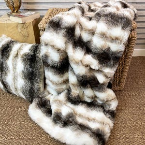 Italian Wolf Faux Fur Throw, Fake Fur Blanket for Bed or Sofa with ivory faux-suede lining in a range of sizes. Imitation fur blanket throw