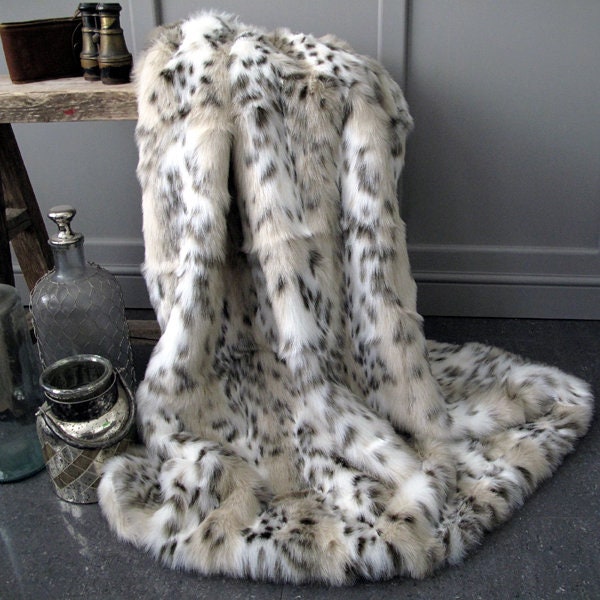 Siberian Lynx animal patterned Faux Fur Throw in a range of sizes.  Fur Blanket Throw for sofa, chair or bed with ivory faux suede lining.