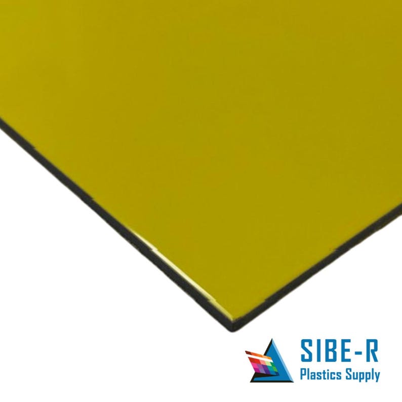 May include: A sheet of bright yellow plastic with a black edge. The plastic is smooth and glossy.