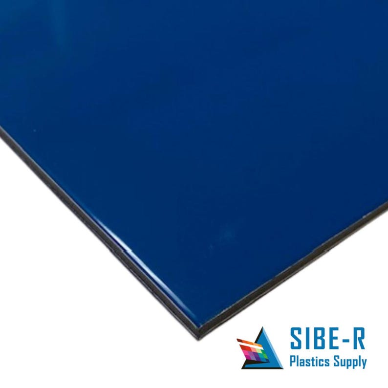 May include: A close-up of a solid blue sheet of plastic. The sheet is smooth and has a slight sheen. The sheet is cut at a 45-degree angle, revealing a black edge.