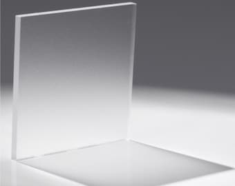May include: A clear, frosted acrylic sheet. The sheet is smooth and translucent, with a slight sheen.