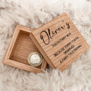 May include: A wooden tooth fairy box with the inscription "Oliver's Tooth Fairy Box Because Every Tooth Deserves A Fairy Tale Ending."