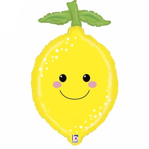 Puede incluir: Un globo amarillo en forma de lim&oacute;n con una cara sonriente y puntos blancos. El globo tiene hojas verdes en la parte superior.