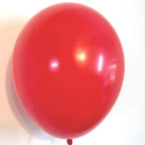May include: A bright red balloon, inflated and ready to be used for a party or celebration.