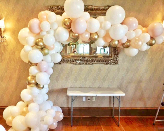 white and gold baby shower balloons