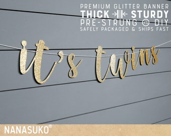 May include: Gold glitter banner that reads "it's twins" with white string. The banner is pre-strung and ready to hang.  The banner is thick and sturdy.  The banner is safely packaged and ships fast.