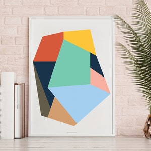 May include: Abstract geometric art print with a white background and a multi-colored geometric shape in the center. The shape is made up of various colors, including red, yellow, blue, green, and brown.