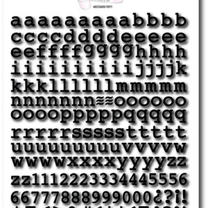 May include: Black and white alphabet and number stamps with a puffy, slightly rounded font. The stamps include uppercase letters, numbers, punctuation marks, and symbols. The stamps are arranged in rows and columns on a white background.