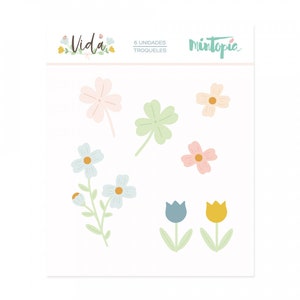 May include: A set of six die-cut floral stickers in various colors, including pink, blue, green, and yellow. The stickers feature a variety of flowers, including clover, daisies, and tulips. The stickers are labeled "Vida" and "Mintopia".