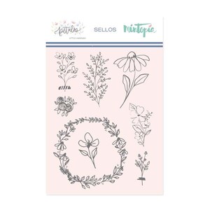 May include: Clear plastic sheet with floral stamp designs. The stamps include various flower and leaf illustrations, such as a daisy, a wreath, and sprigs. The sheet has the words "petalos", "sellos", and "Mintopia" printed on it.