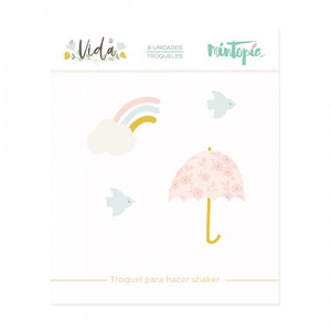 May include: A package of die-cut shapes for crafting, featuring a rainbow, cloud, umbrella, and birds. The umbrella has a floral pattern. The text "Vida" and "Mintopia" are visible.