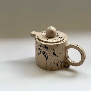 Handmade ceramic teapot 16 oz volume, Tea lovers gift, Beige top with black splashed ceramic teapot, Unique and modern teapot, made to order