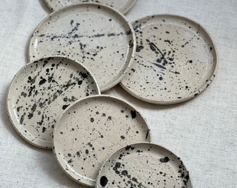 Small beige stoneware clay plate, Black spot staining with a brush, Appetizer plate