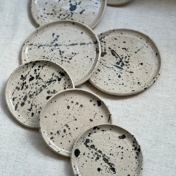 Small beige stoneware clay plate, Black spot staining with a brush, Appetizer plate