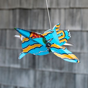 Handcrafted Flying Pig Wind Spinner: Recycled Can Kinetic Art