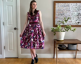 Early 1960’s floral fit & flare dress floral print velvet two-tone ribbon trim unique construction crossover in back excellent condition S