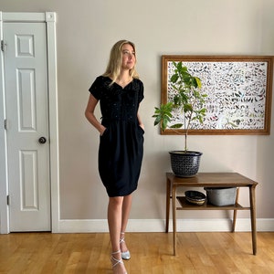 1940’s black formal dress, studs rhinestones and big bow on bodice, pockets in the skirt, rayon crepe, excellent condition, size M/L