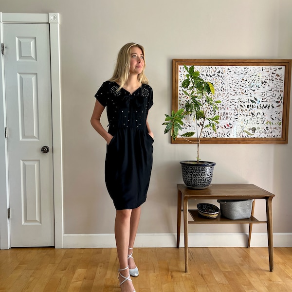 1940’s black formal dress, studs rhinestones and big bow on bodice, pockets in the skirt, rayon crepe, excellent condition, size M/L