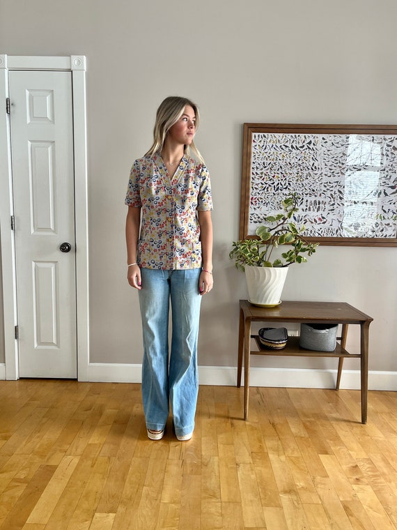 Late 1960’s floral top with super cool yellow/gold