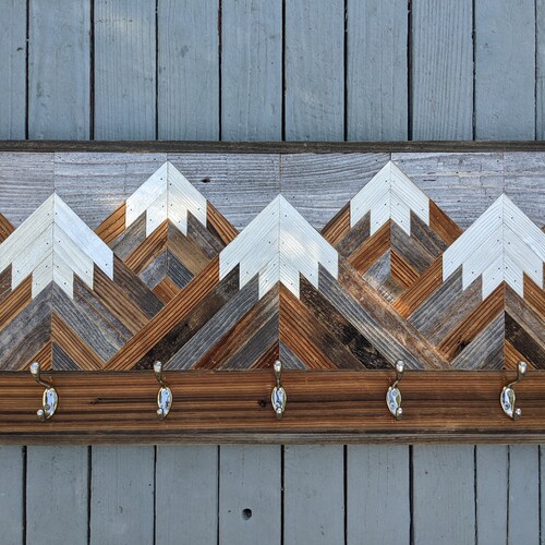 Rustic coat hook mountain wood wall art panoramic with gray sky. Hand crafted from reclaimed wood by DoxaDesign