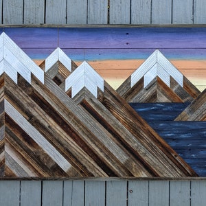 Rustic mountain wood wall art asymmetrical with soft sunset sky and lake. Hand crafted from reclaimed wood by DoxaDesign