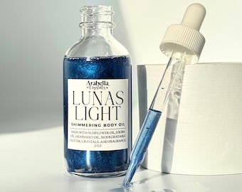 Olio illuminante Lunas Light Crystal Infused: Olio per il corpo profumato al muschio di Moon Lake