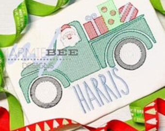 May include: A green vintage truck with Santa Claus in the driver's seat, carrying a stack of wrapped gifts. The truck has a white background with the name "HARRIS" written in blue below the truck.