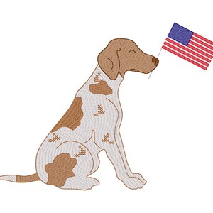 May include: An embroidered illustration of a dog sitting, holding a small American flag in its mouth. The dog is white with brown patches and brown ears. The flag has red and white stripes and a blue field with white stars.