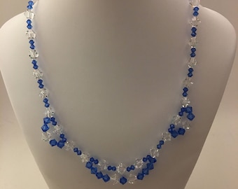 Gorgeous royal blue and clear Swarovski Crystal necklace and earring set.