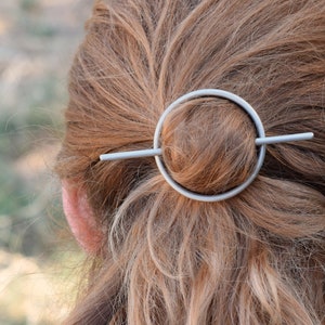 Silver circle hair barrette with silver stick image 1