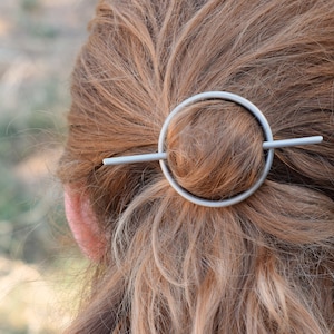 Silver circle hair barrette with silver stick image 1