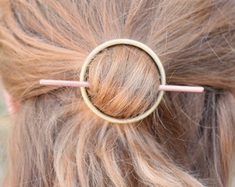 Brass circle hair barrette with copper stick