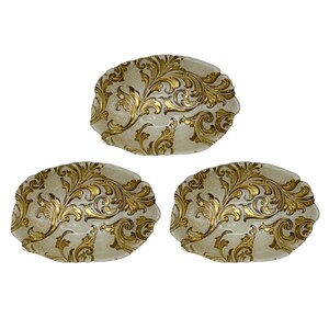 May include: Set of three oval-shaped serving bowls with a white background and gold leaf floral pattern.
