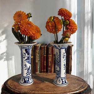 Pair of Delft beaker vases, antique blue and white glazed cylindrical & narrow vessels , featuring blue bird scenes on a white background.