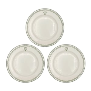 May include: Three white ceramic plates with a green floral border and a green crest in the center.