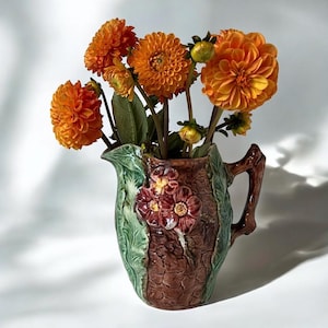 Majolica Antique Simon Fielding Jug / Pitcher of Pink Japanese Flowering Cherry blossoms & Leaves against Brown | Glazed Beige interior.